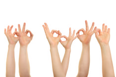This image shows six hands giving the OK symbol. By ensuring you give positive body language to potential employers you can be successful.